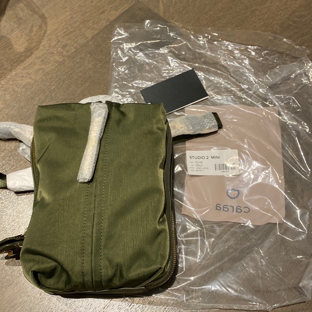 Caraa studio 2 Mini Olive with gold hardware. New with tags and duster